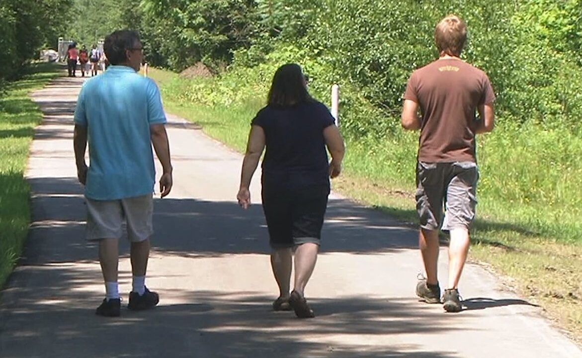 People Walking On Riverwalk 062918
