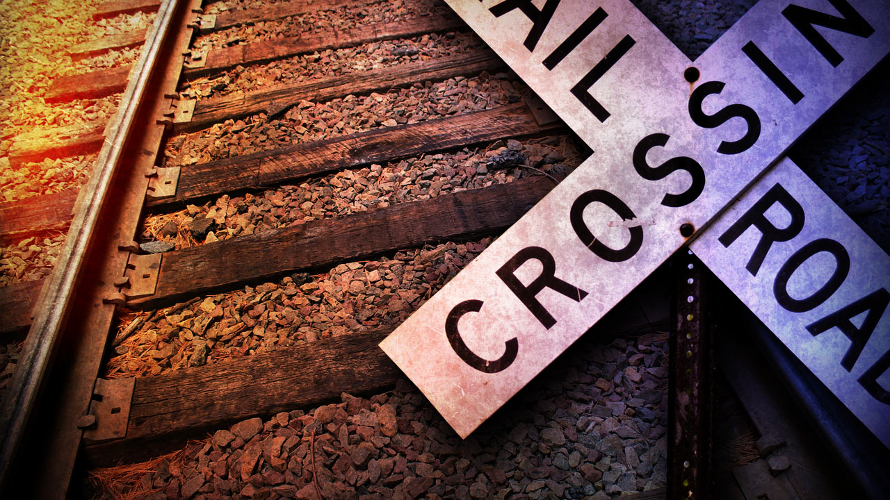 Train Collides with Vehicle