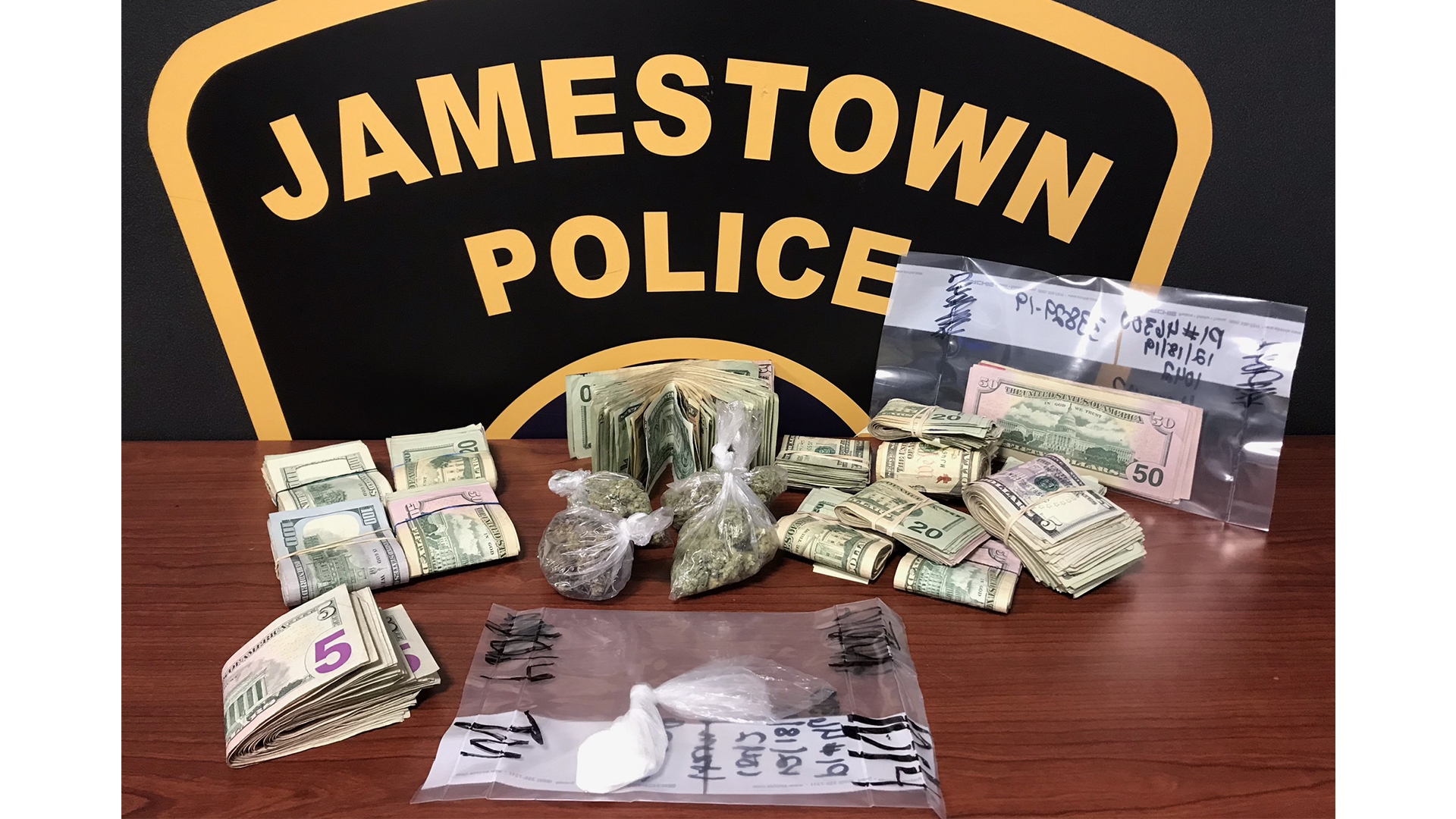 Police Arrest Men With Large Amount Of Cash, Cocaine And Marijuana