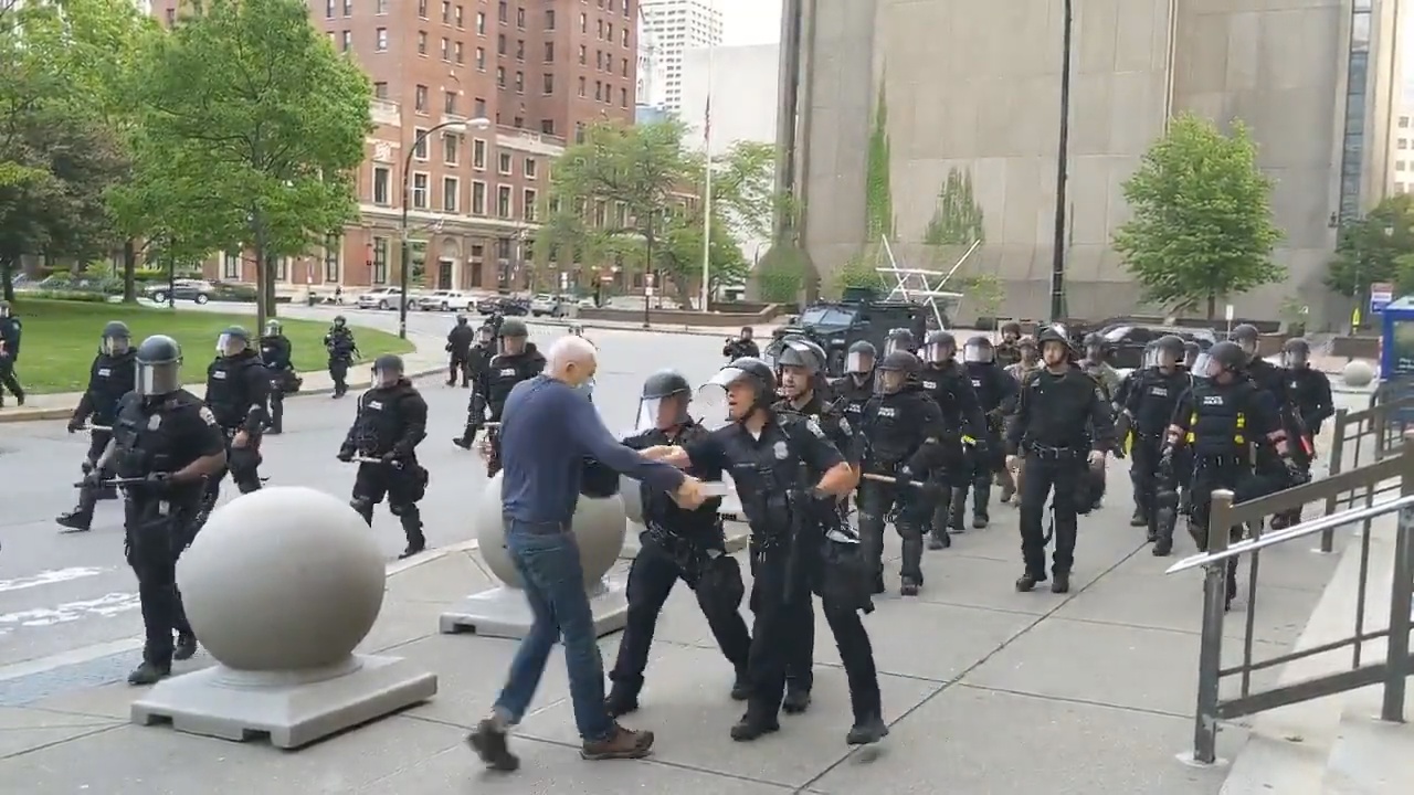 VIDEO: Police Officer Suspended After Shoving Elderly Man During Protest