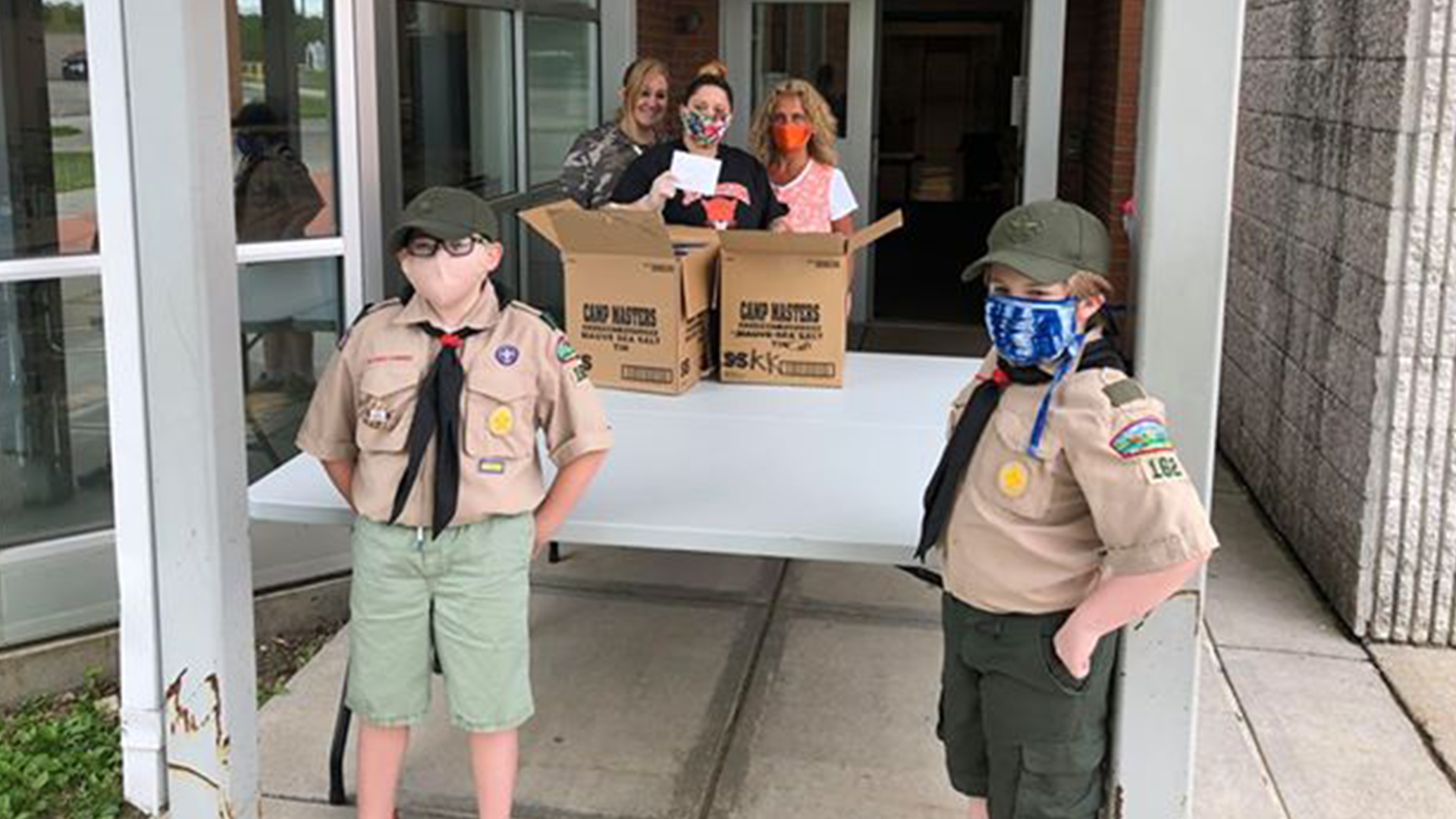 Local Boy Scout Troop Delivers Popcorn To Thank School Food Service Workers