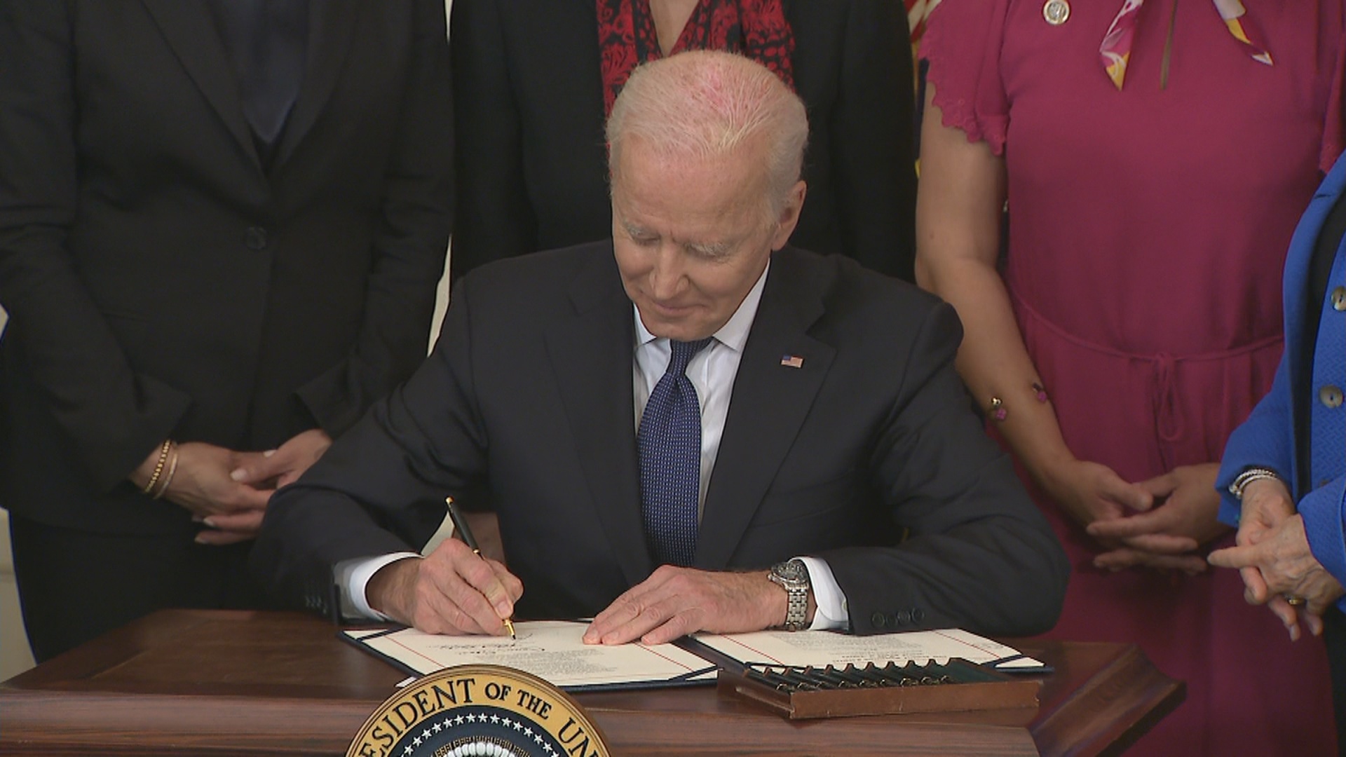 Biden Signs Bill To Counter Spike In Anti-Asian Hate Crime