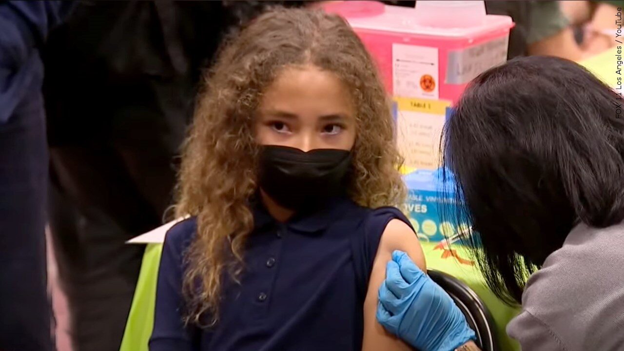 Child receiving Pfizer COVID-19 vaccine
