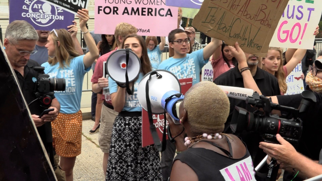Protesters Rally Outside Supreme Court, Waiting on Abortion Rights Decision