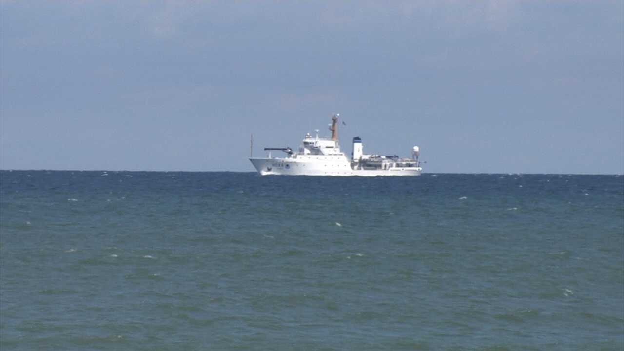 Ship Seen Along Shore Canvassing Lake Floor for First Time Since 1940s